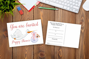Postcard Invitations for a Puppy Shower Front and Back Sitting on a Desk